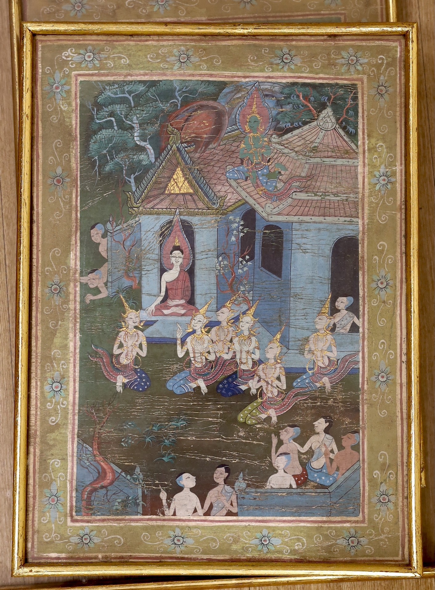 A pair of 19th century Thai gouache, depicting Buddhist figures, 41 x 20cm